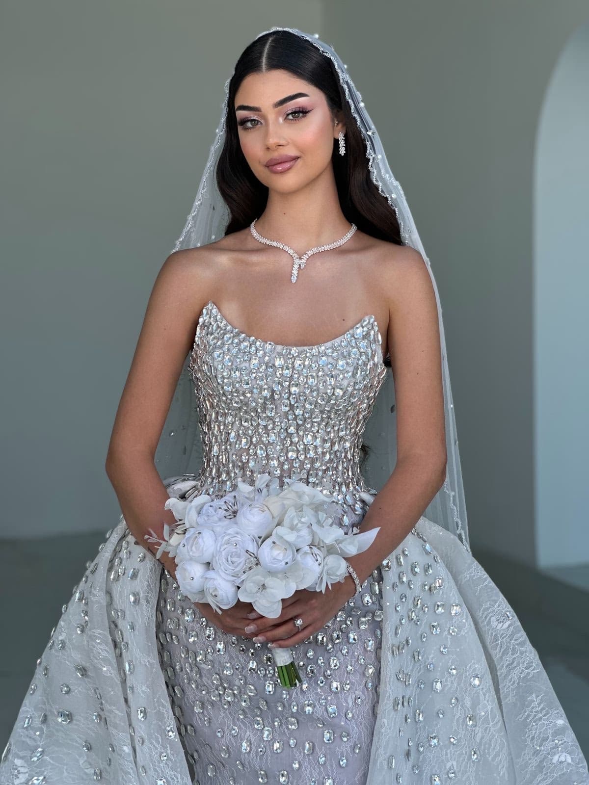 Arabic-Western fusion bride in Sharjah with contemporary bridal makeup blending Arabic and Western aesthetics by Elani Artistry