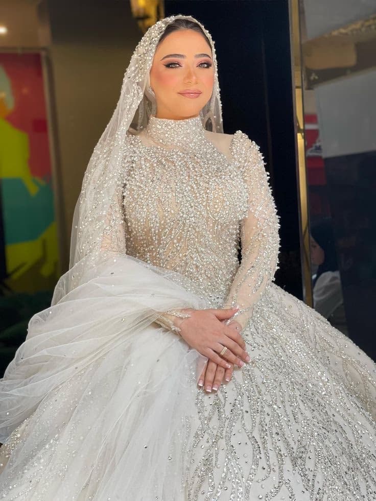 Lebanese bride in Sharjah with editorial Arabic bridal makeup, sculpted eyes extended liner and polished glam finish by Elani Artistry